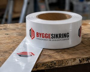 Byggesikring TapeTeam Afspærringsbånd med tryk, minestrimmel med logo